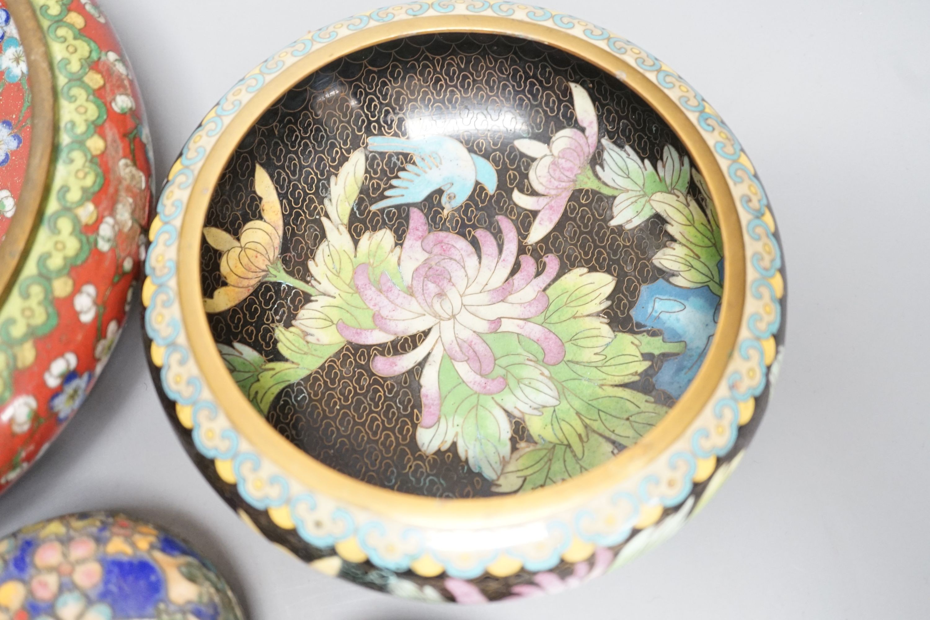 A group of Chinese cloisonné enamel dishes, boxes and a pair of vases, early 20th century and later, largest diameter 17cm